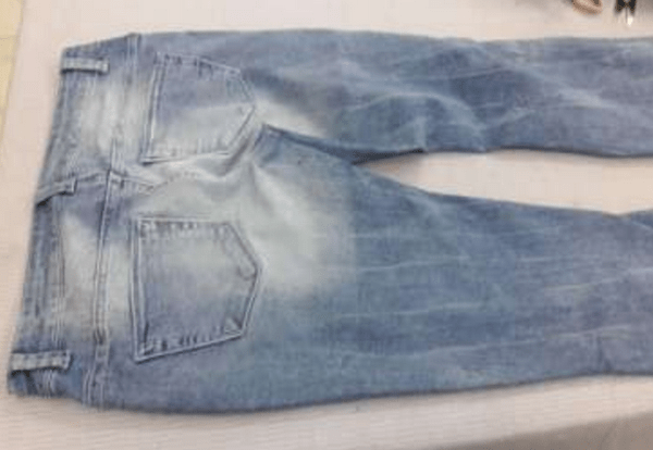 caustic washed jeans