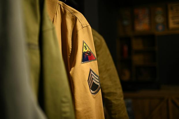 Vintage tan jacket with woven patches